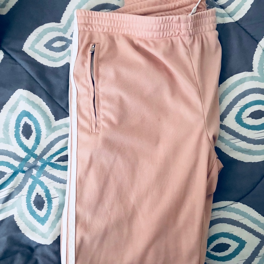 Pink tracksuit style pants